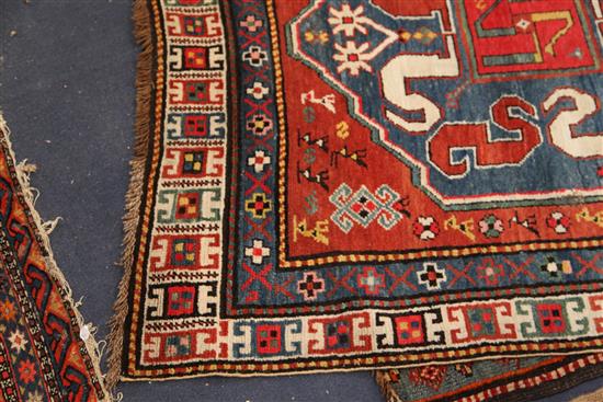 A Kazak red ground rug, c.1885, 7ft 6in by 3ft 11in.